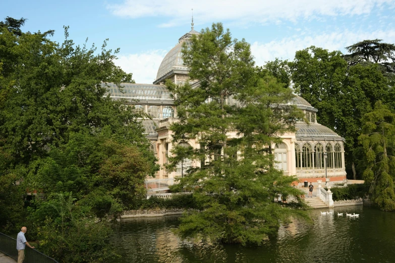 a beautiful house by the water is near the park