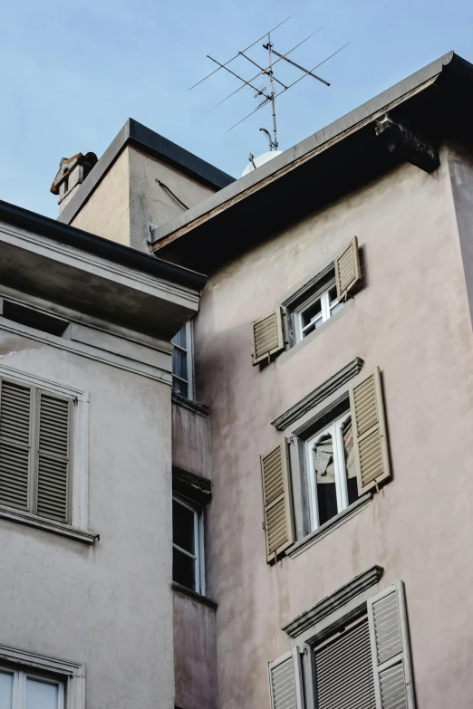 the windows are closed and a building is next to it