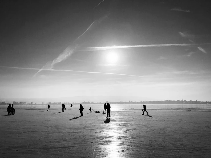 people are walking in the snow with skis