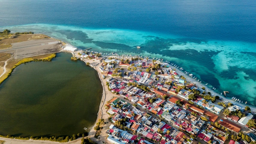 this is an aerial view of an area that includes a beach and many small coastal areas