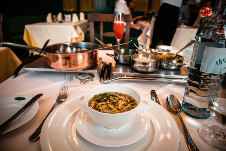 a very nice looking bowl of soup on a table