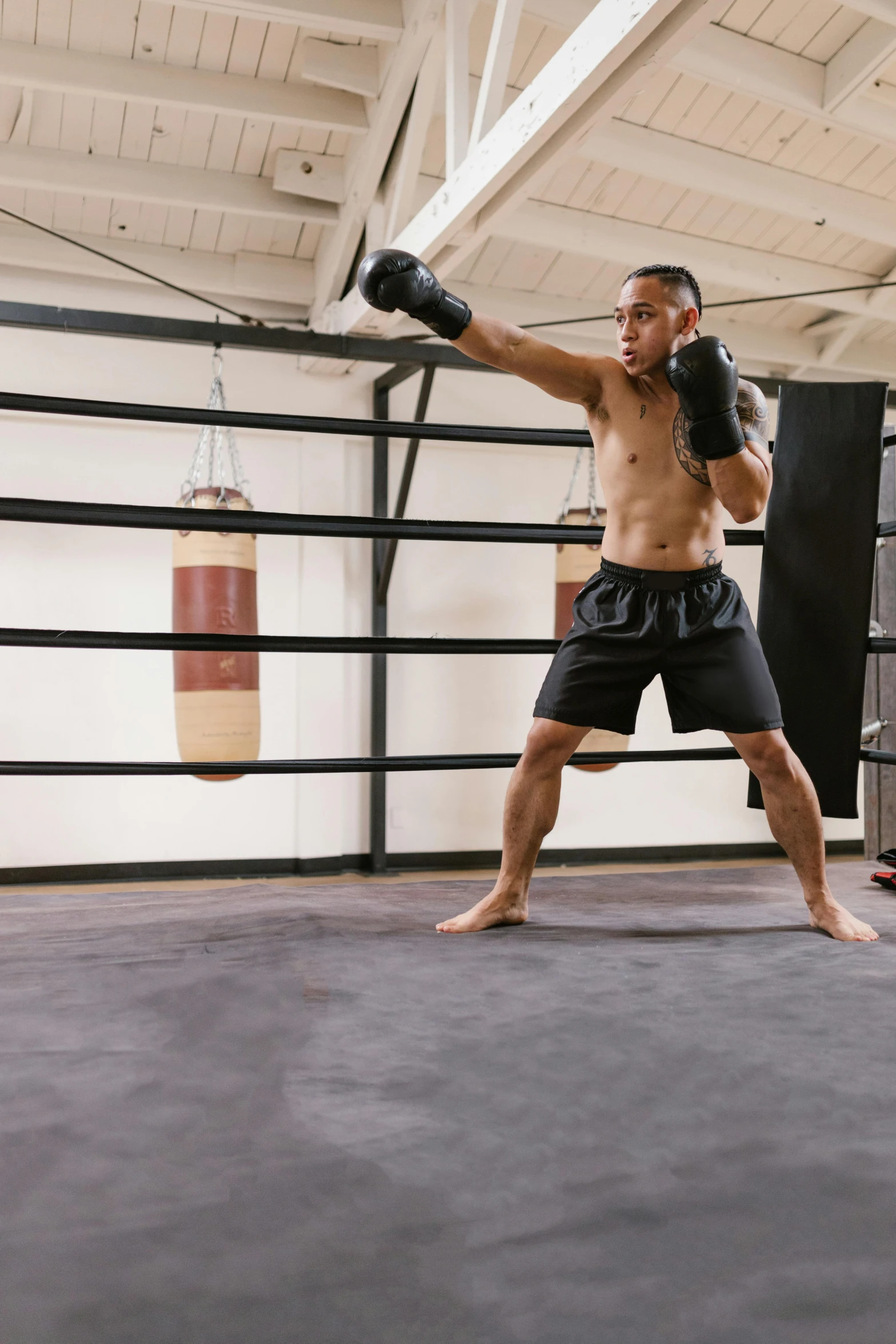 a man with  on in the ring boxing