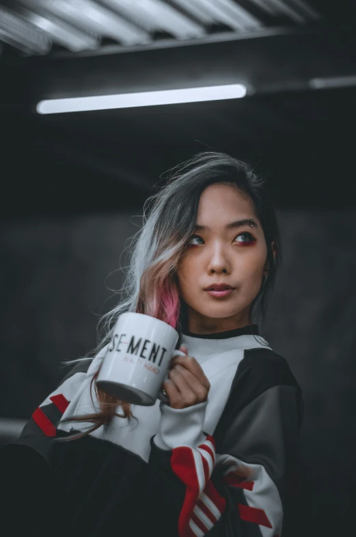the girl holding a coffee mug that says men