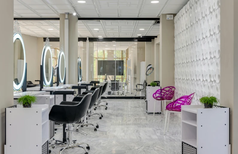 a big fancy hair salon with a few chairs