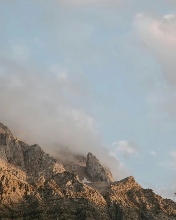 a mountain range covered in low cloud