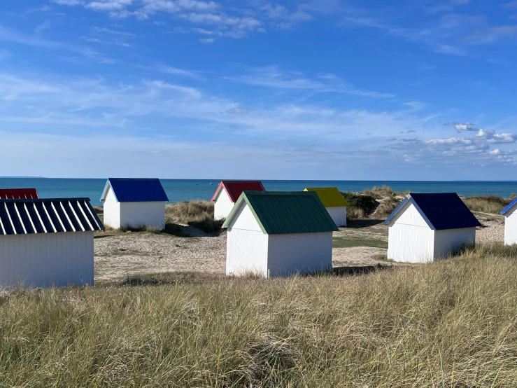 a row of houses next to a body of water