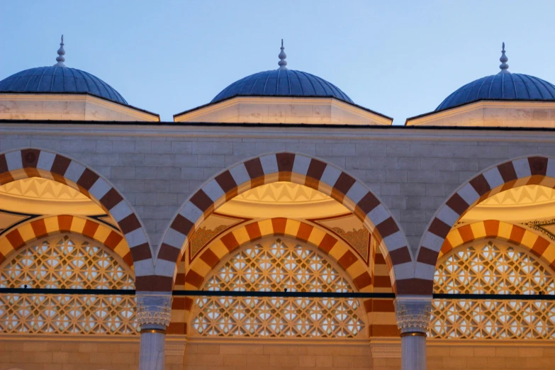 the arches of the facade of an elaborate building