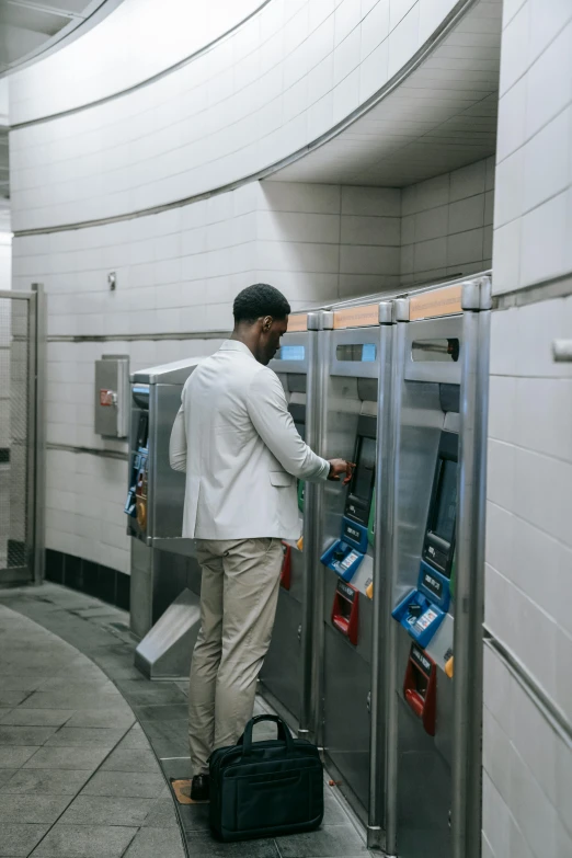 a man using the machine in a building