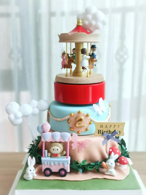 a colorful birthday cake sitting on top of a table