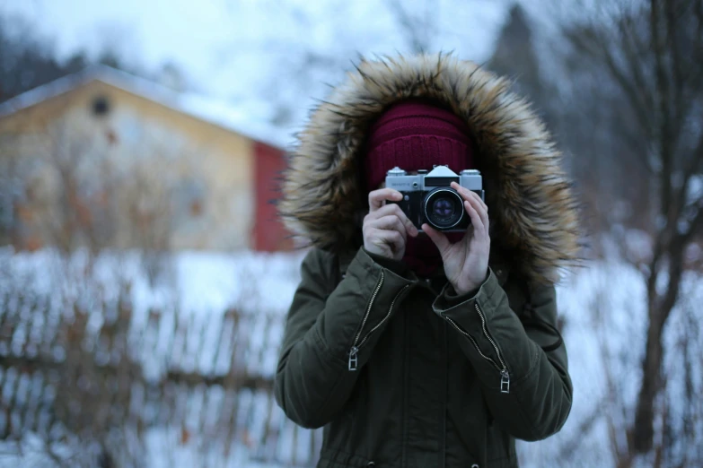 a person takes a po with a camera