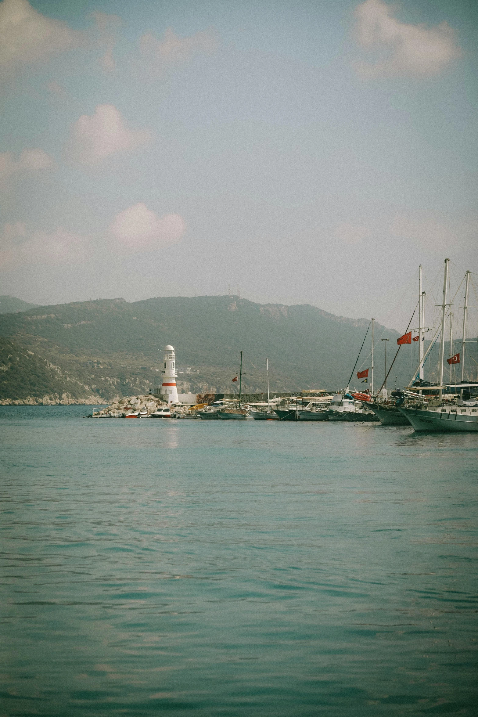 a ship is docked near a body of water