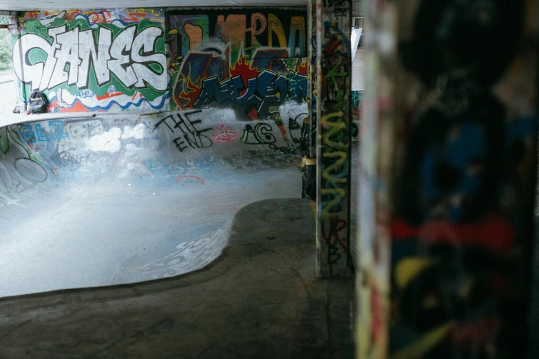 an extreme po of a skate park with graffiti