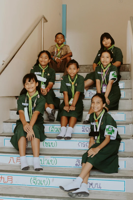 several s on stairs and medals around their necks