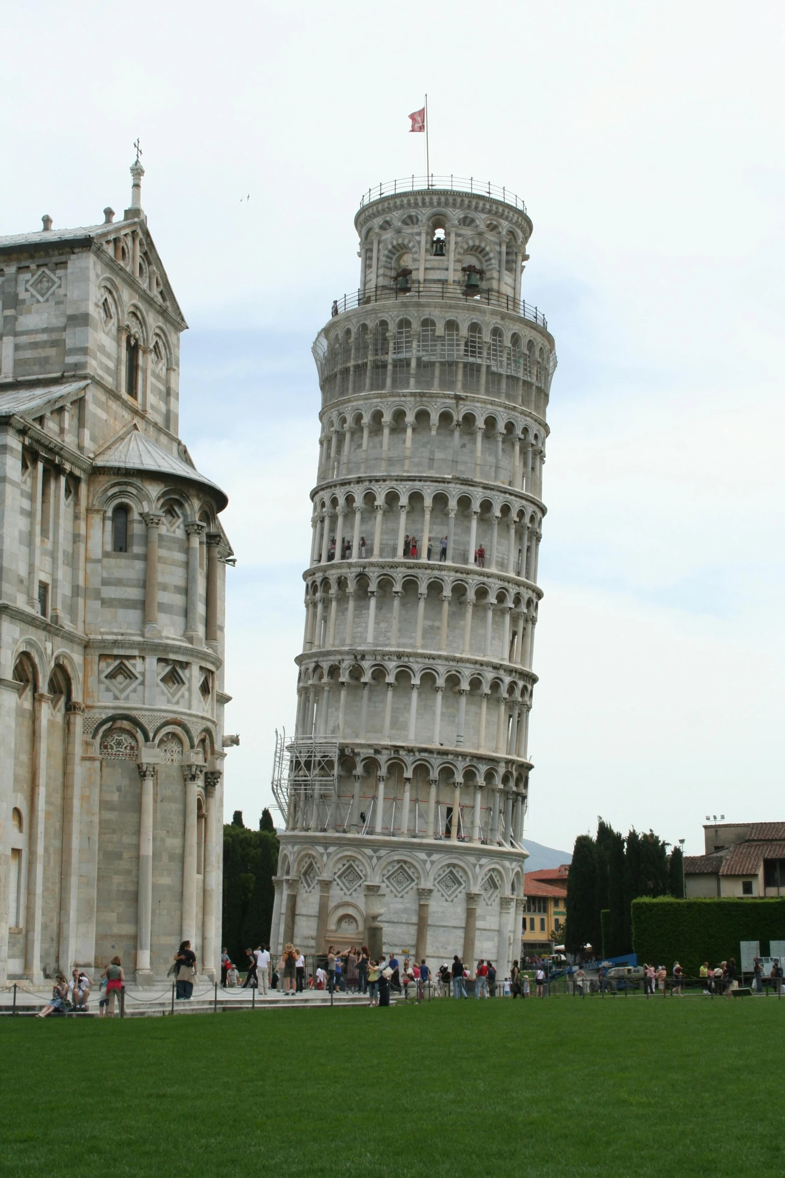 the two tall towers are on either side of the grassy area