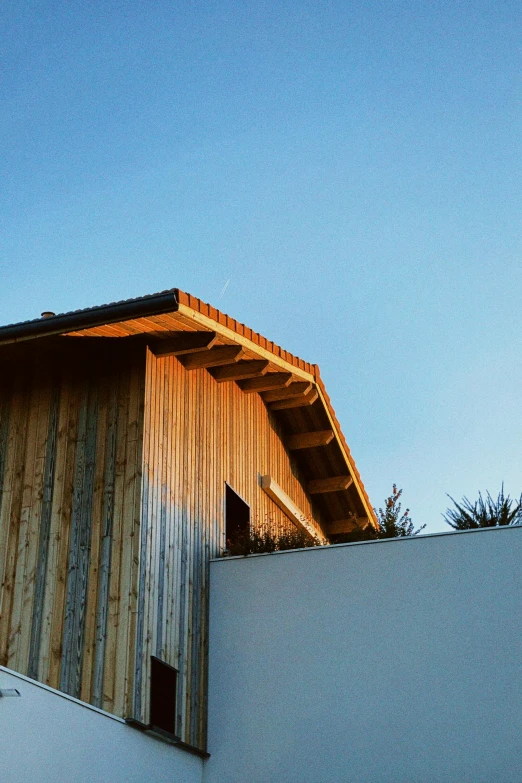 a house under construction that is standing at the corner of a lot