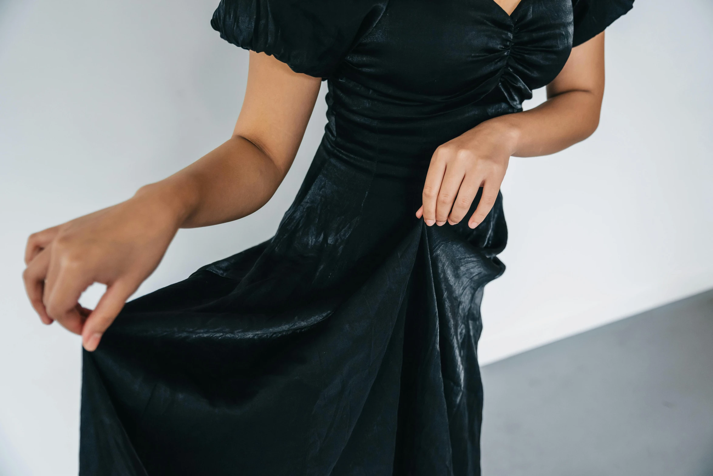 a close up s of a woman in a black dress