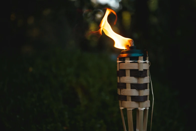 a lit object made of sticks with fire