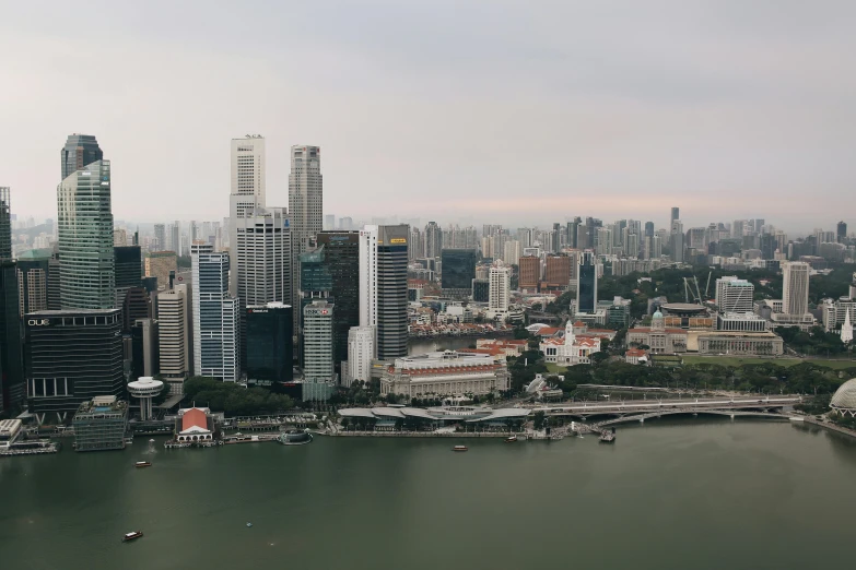 an aerial view of a city and water