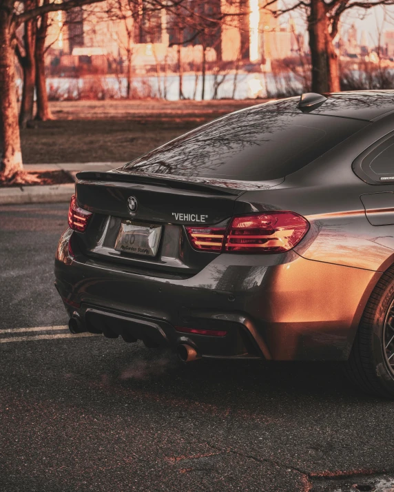 a brown car parked on the side of the road