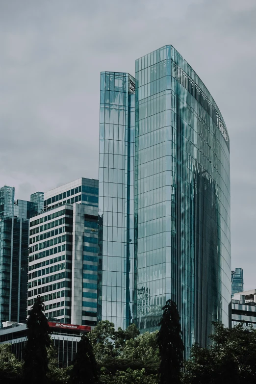 a large office building sitting next to trees