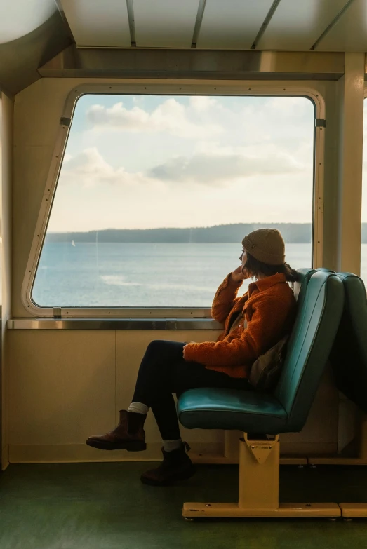 woman on ferry looking out of the window