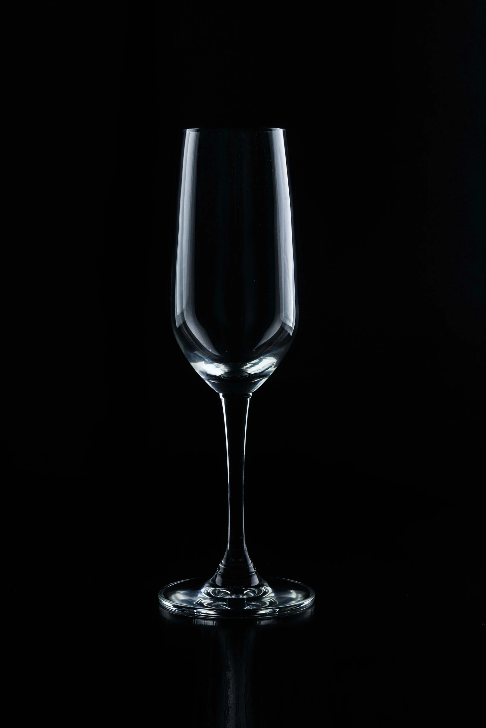 a very plain looking glass on a black table