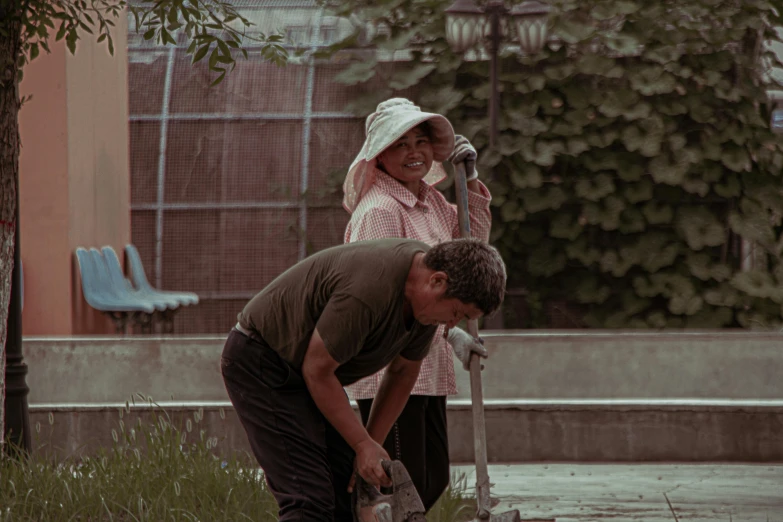 the woman is washing her feet with the man