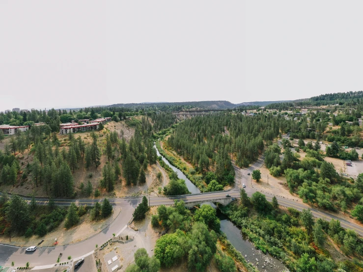 a high level aerial view of a curve in a road