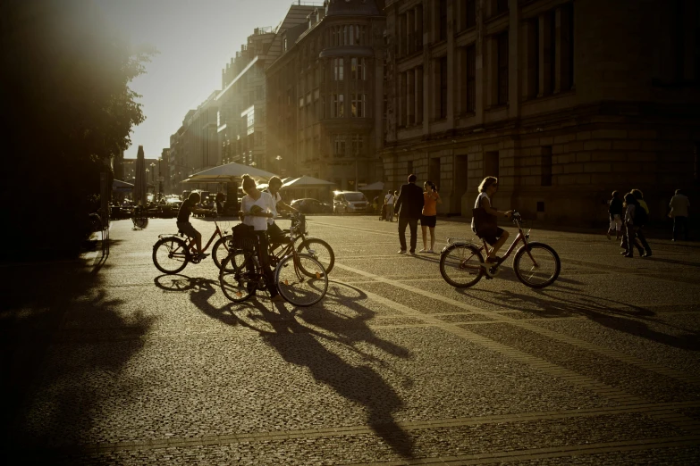 a city street is full of pedestrians and bikes