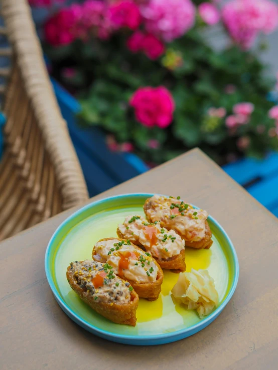 a plate with several bites of food on it