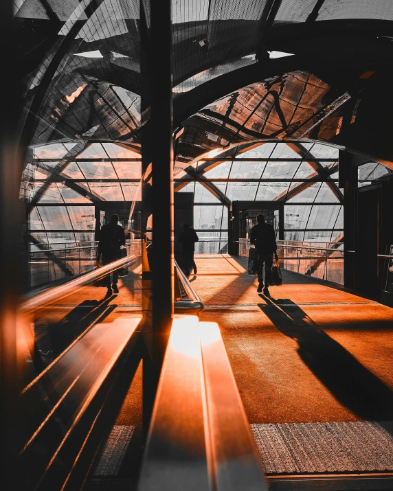 a wooden bench in the middle of a covered area