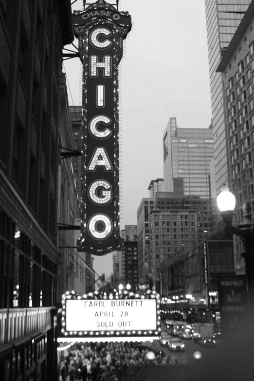 there is a black and white po of a chicago sign