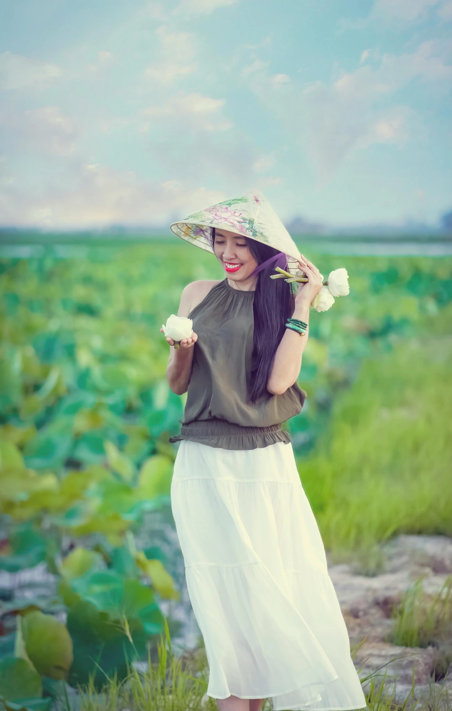 a beautiful young lady posing for a po