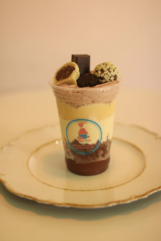 a chocolate desert on a table with some cookies in the top