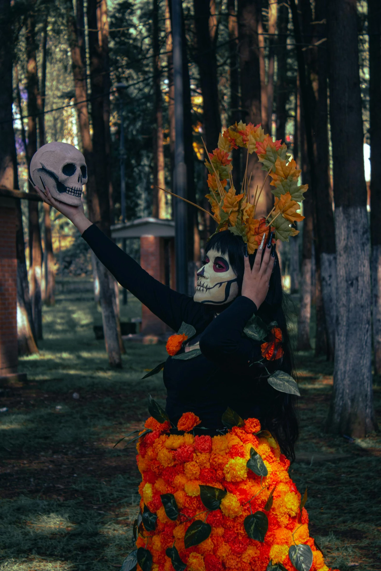 a woman wearing makeup and holding up her face