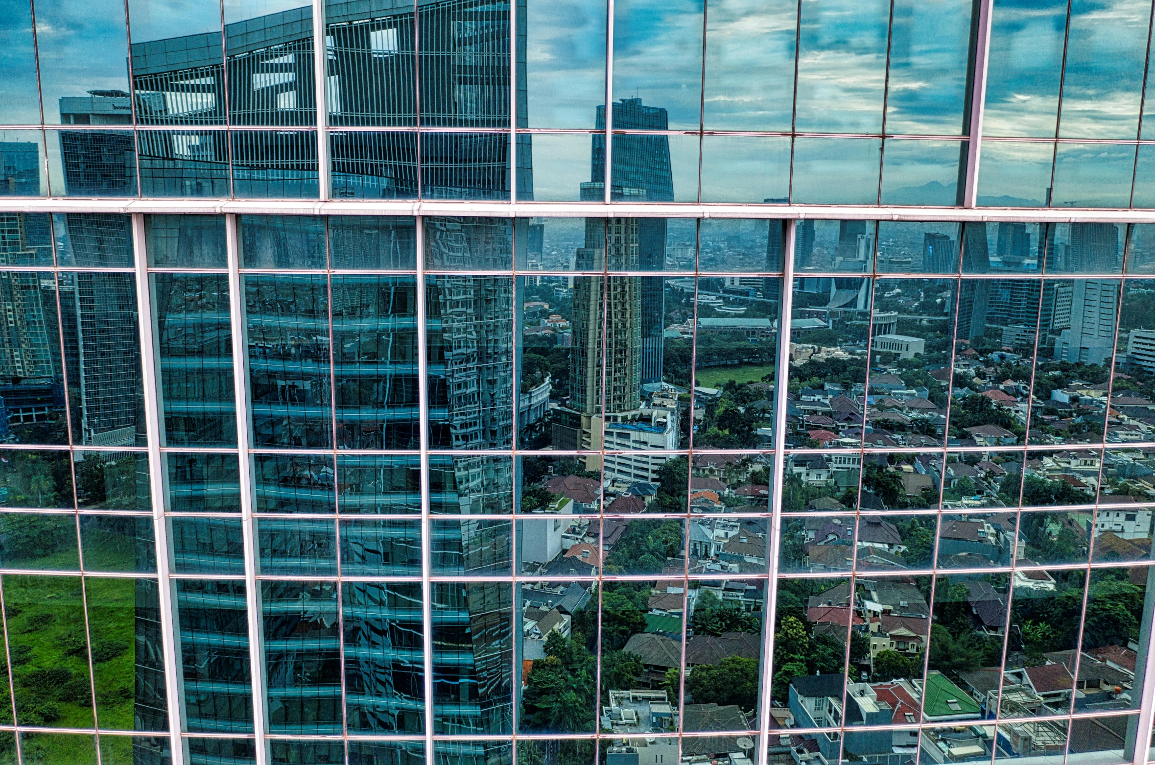 an abstract view of the city through some glass