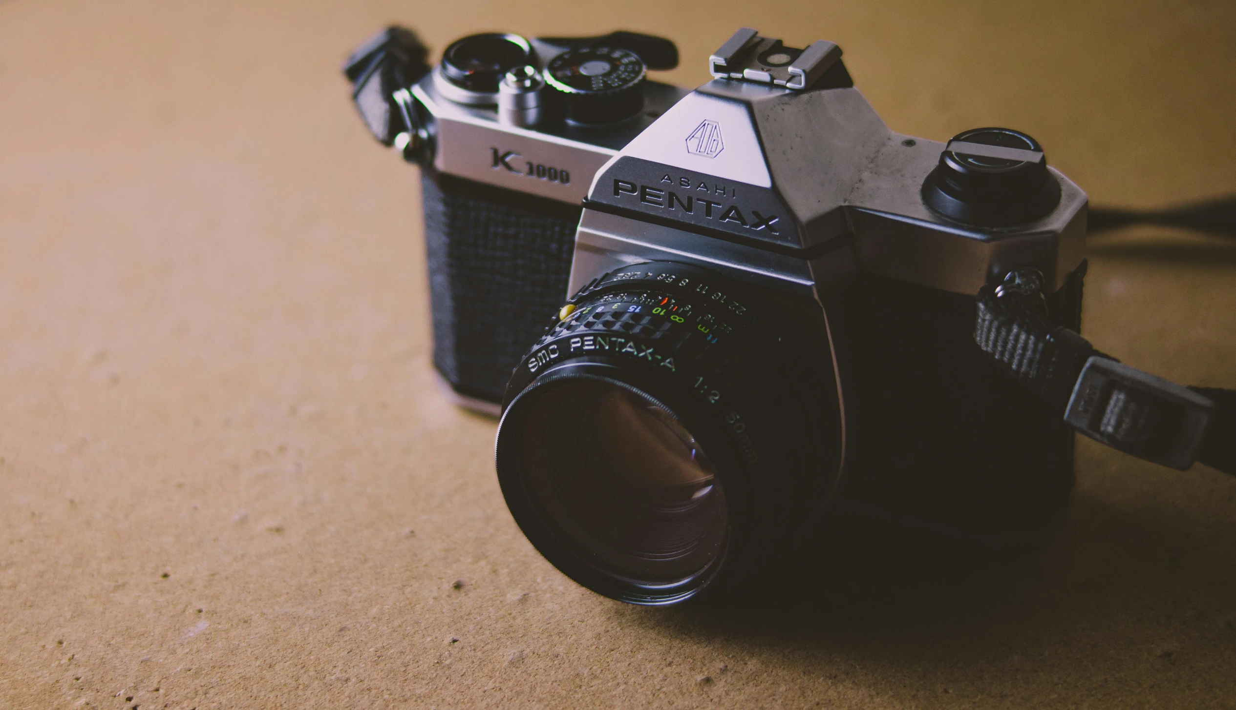 an old camera that is on the table