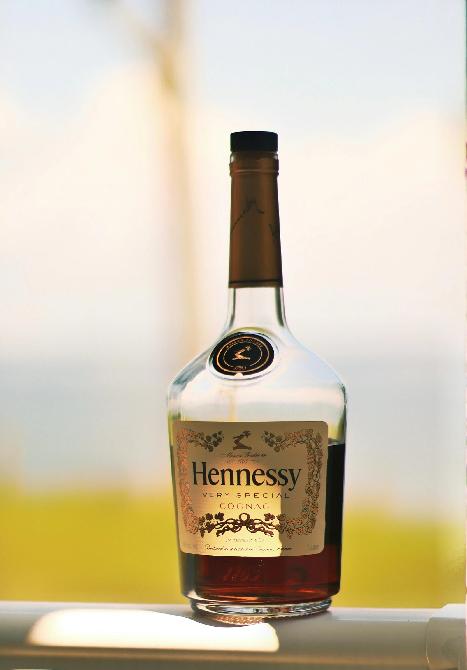 the bottle has a label that says henness