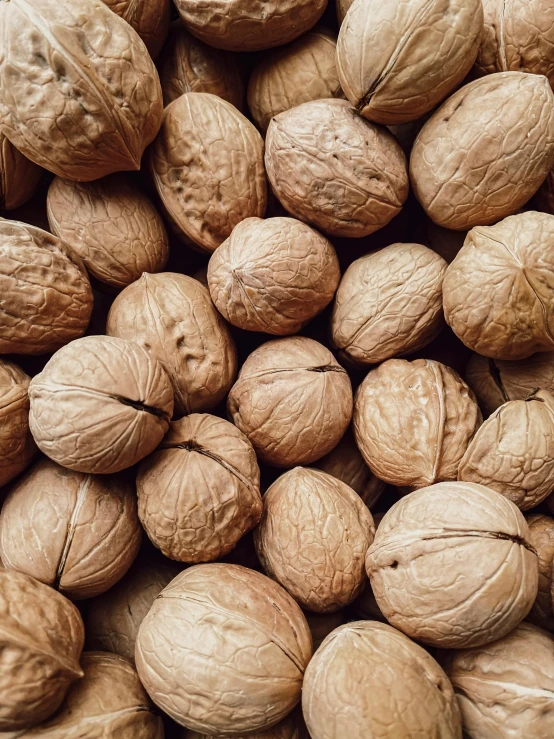 a group of nuts sitting on top of each other