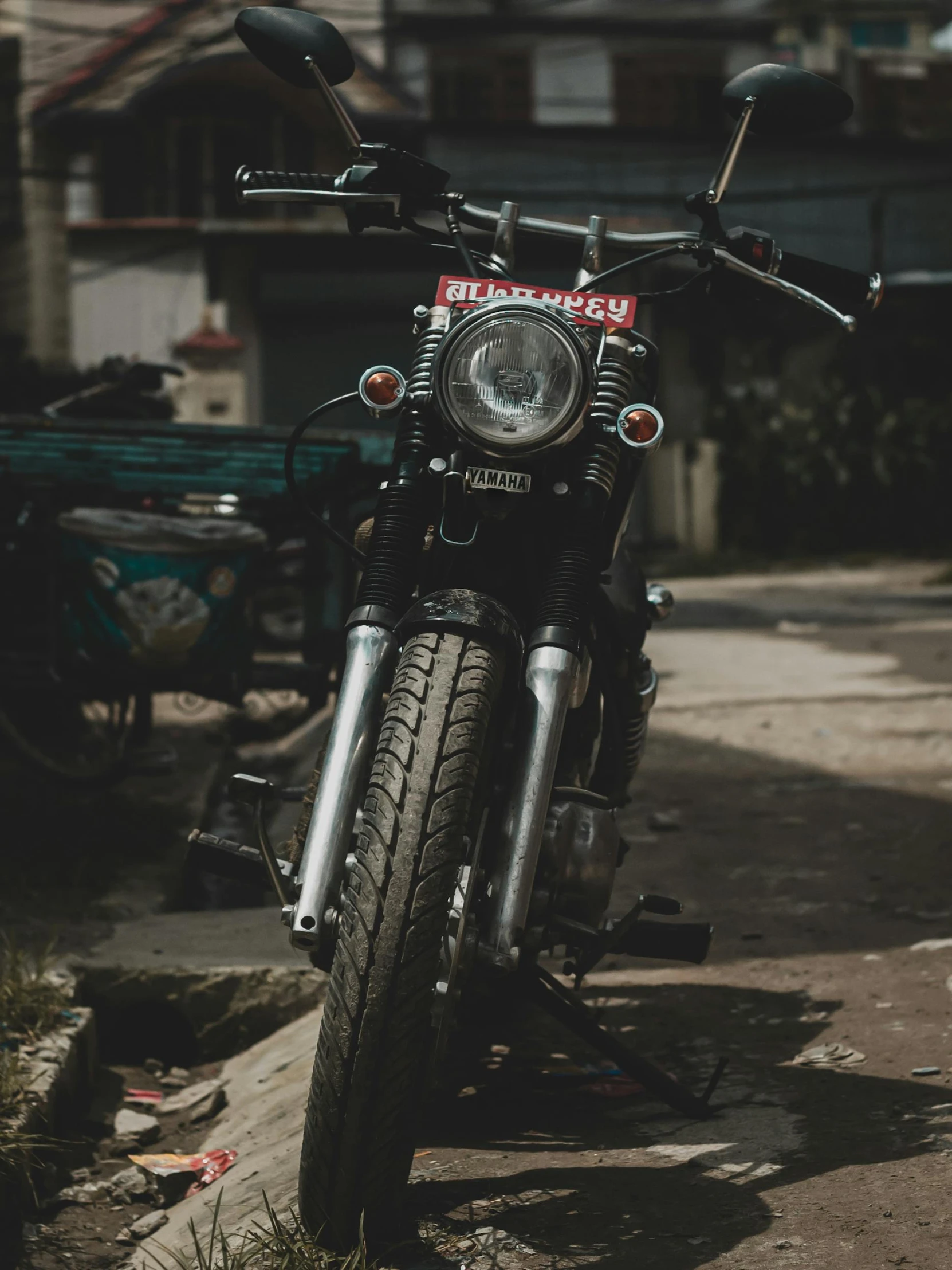 a motorcycle parked on the side of the road