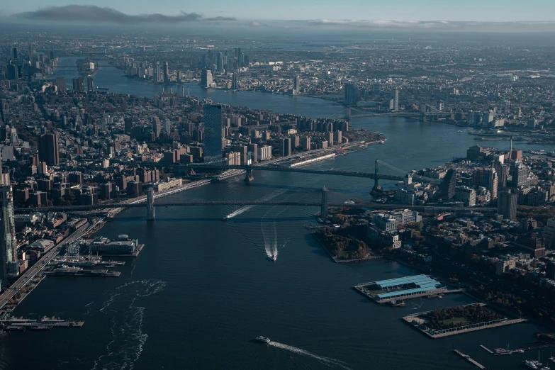 an aerial view of the city and the river