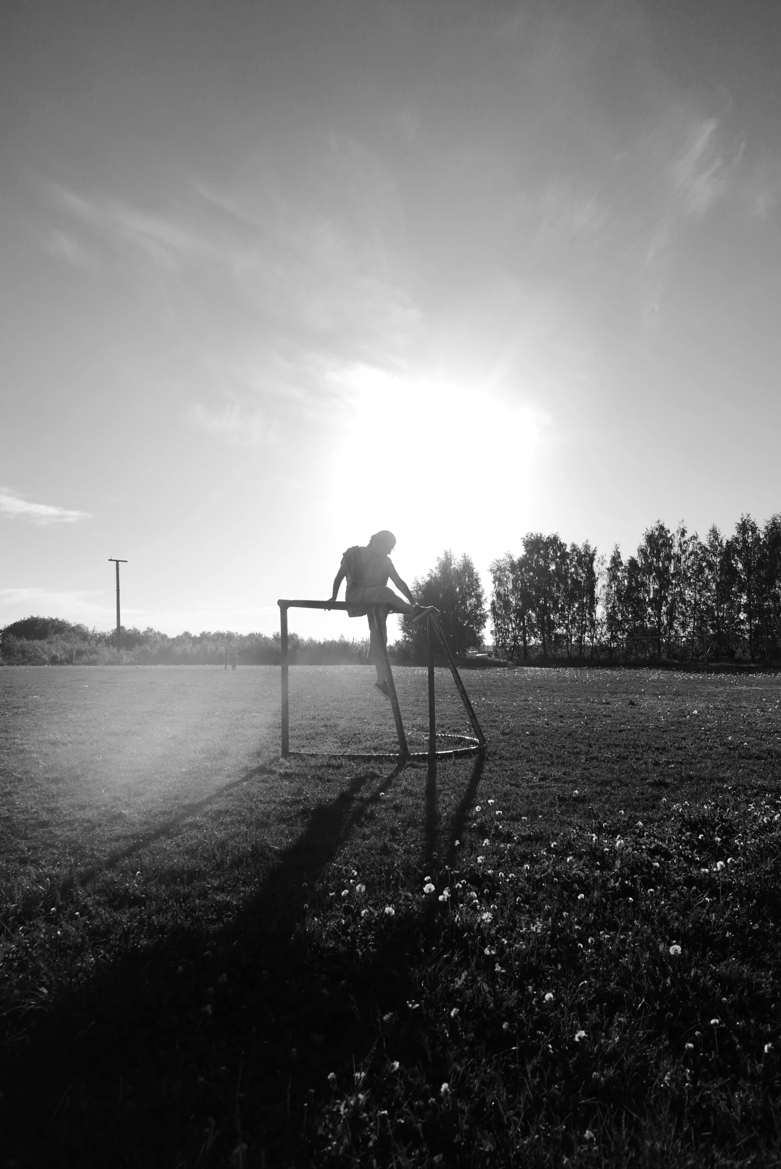 a person that is sitting on top of a bench