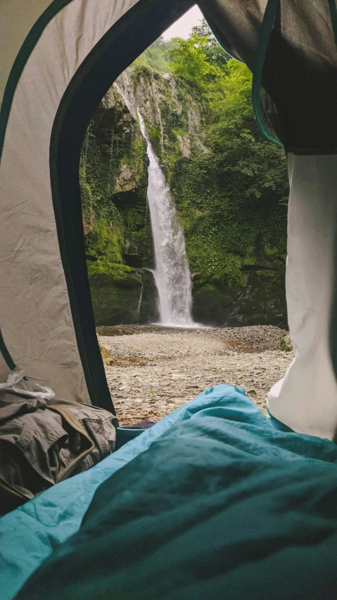 inside a tent looking into the water below