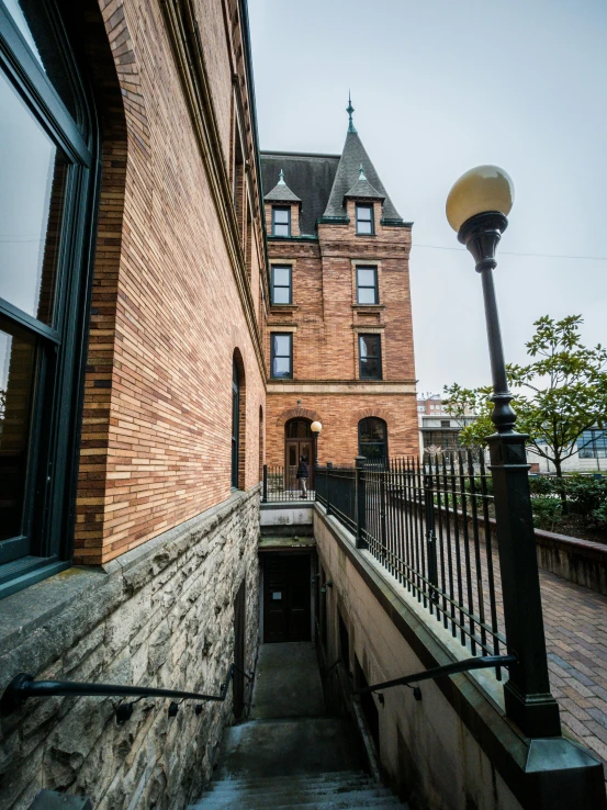 a very old brick house in a historic setting