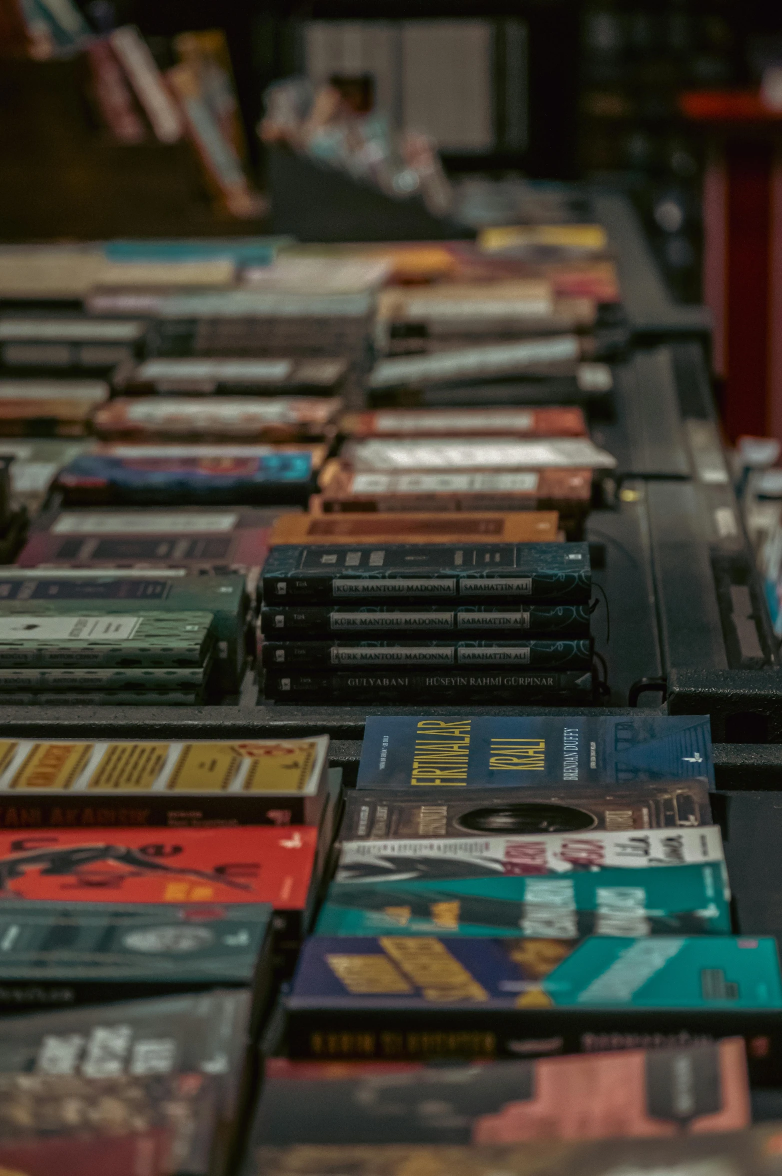 a long table topped with lots of dvds