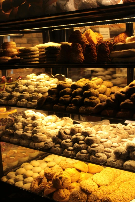 a case filled with different kinds of donuts