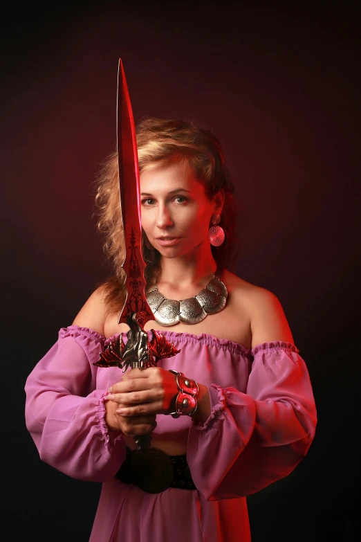 girl with a red dress and a large sword