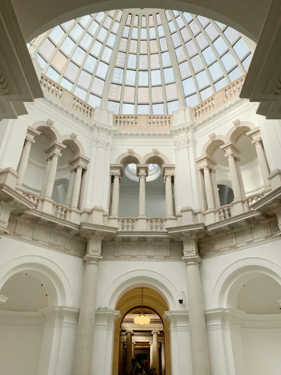 an open building with a skylight over a stairwell