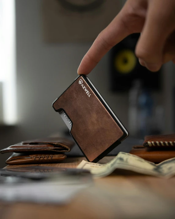 a person is taking a wallet out of a wallet
