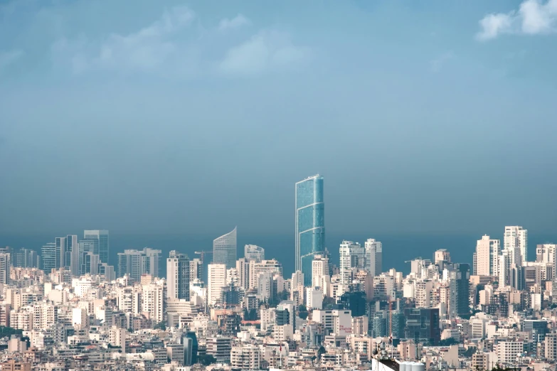 a large body of water next to a very big city